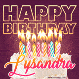 A colorful birthday cake topped with lit candles, with the words 'Happy Birthday Lysandra' in bold glowing letters on a burgundy background. Animated flames add a festive touch.