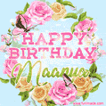 A charming animated GIF featuring 'Happy Birthday Maanya' in pink and green text, surrounded by delicate roses, leaves, and fluttering butterflies on a soft light blue pastel background.