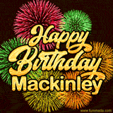 Golden text reading 'Happy Birthday Mackinley' surrounded by vibrant fireworks in red, green, and yellow, set against a dark background in this celebratory birthday GIF.