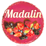 Beautifully decorated red velvet berry birthday cake with vibrant fruits and a glowing 'Madalin' name, adding a touch of sweetness and sparkle.
