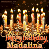 A glowing personalized birthday GIF with name Madalina featuring lit candles with intricate designs, warm lighting, and the text 'Happy Birthday' in an elegant font.