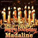 A glowing personalized birthday GIF with name Madaline featuring lit candles with intricate designs, warm lighting, and the text 'Happy Birthday' in an elegant font.