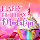 A vibrant birthday GIF featuring a rainbow-colored cupcake topped with white frosting, sprinkles, and a lit candle. The text reads 'Happy Birthday Madalyn' in bold pink and violet letters with white outline.