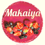 Beautifully decorated red velvet berry birthday cake with vibrant fruits and a glowing 'Makaiya' name, adding a touch of sweetness and sparkle.