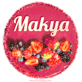 Beautifully decorated red velvet berry birthday cake with vibrant fruits and a glowing 'Makya' name, adding a touch of sweetness and sparkle.