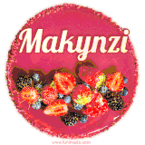 Beautifully decorated red velvet berry birthday cake with vibrant fruits and a glowing 'Makynzi' name, adding a touch of sweetness and sparkle.