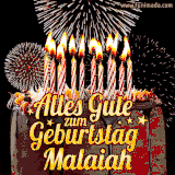 A chocolate birthday cake with glowing candles, the German text 'Alles Gute zum Geburtstag Malaiah,' and vibrant fireworks lighting up the background in an animated GIF.