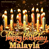 A glowing personalized birthday GIF with name Malayla featuring lit candles with intricate designs, warm lighting, and the text 'Happy Birthday' in an elegant font.