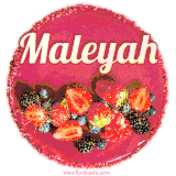 Beautifully decorated red velvet berry birthday cake with vibrant fruits and a glowing 'Maleyah' name, adding a touch of sweetness and sparkle.