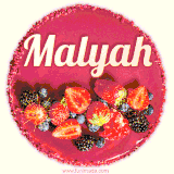Beautifully decorated red velvet berry birthday cake with vibrant fruits and a glowing 'Malyah' name, adding a touch of sweetness and sparkle.