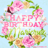 A charming animated GIF featuring 'Happy Birthday Maricruz' in pink and green text, surrounded by delicate roses, leaves, and fluttering butterflies on a soft light blue pastel background.