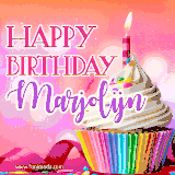 A vibrant birthday GIF featuring a rainbow-colored cupcake topped with white frosting, sprinkles, and a lit candle. The text reads 'Happy Birthday Marjolijn' in bold pink and violet letters with white outline.