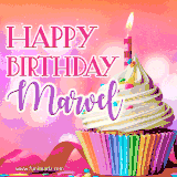 A vibrant birthday GIF featuring a rainbow-colored cupcake topped with white frosting, sprinkles, and a lit candle. The text reads 'Happy Birthday Marvel' in bold pink and violet letters with white outline.