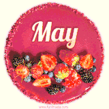 Beautifully decorated red velvet berry birthday cake with vibrant fruits and a glowing 'May' name, adding a touch of sweetness and sparkle.