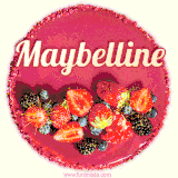Beautifully decorated red velvet berry birthday cake with vibrant fruits and a glowing 'Maybelline' name, adding a touch of sweetness and sparkle.