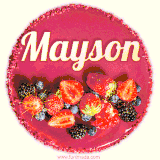 Beautifully decorated red velvet berry birthday cake with vibrant fruits and a glowing 'Mayson' name, adding a touch of sweetness and sparkle.