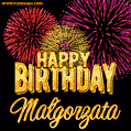 A golden 'Happy Birthday Małgorzata' message with vibrant fireworks in the background, creating a festive and celebratory vibe in this animated name GIF.