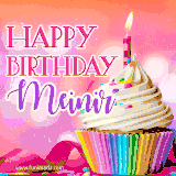 A vibrant birthday GIF featuring a rainbow-colored cupcake topped with white frosting, sprinkles, and a lit candle. The text reads 'Happy Birthday Meinir' in bold pink and violet letters with white outline.