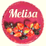 Beautifully decorated red velvet berry birthday cake with vibrant fruits and a glowing 'Melisa' name, adding a touch of sweetness and sparkle.