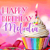 A vibrant birthday GIF featuring a rainbow-colored cupcake topped with white frosting, sprinkles, and a lit candle. The text reads 'Happy Birthday Melodia' in bold pink and violet letters with white outline.