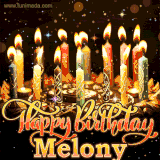 A glowing personalized birthday GIF with name Melony featuring lit candles with intricate designs, warm lighting, and the text 'Happy Birthday' in an elegant font.