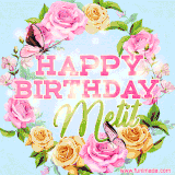 A charming animated GIF featuring 'Happy Birthday Metit' in pink and green text, surrounded by delicate roses, leaves, and fluttering butterflies on a soft light blue pastel background.