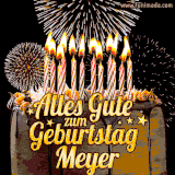 A chocolate birthday cake with glowing candles, the German text 'Alles Gute zum Geburtstag Meyer,' and vibrant fireworks lighting up the background in an animated GIF.