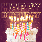 A colorful birthday cake topped with lit candles, with the words 'Happy Birthday Mi' in bold glowing letters on a burgundy background. Animated flames add a festive touch.