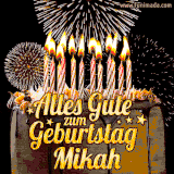 A chocolate birthday cake with glowing candles, the German text 'Alles Gute zum Geburtstag Mikah,' and vibrant fireworks lighting up the background in an animated GIF.