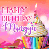 A vibrant birthday GIF featuring a rainbow-colored cupcake topped with white frosting, sprinkles, and a lit candle. The text reads 'Happy Birthday Mingyu' in bold pink and violet letters with white outline.