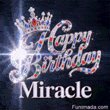 Detailed view of colorful red, blue, and green gemstones embedded in a silver tiara above Miracle's name.