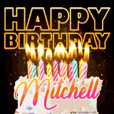 A vibrant animated GIF featuring a delicious birthday cake topped with glowing candles and the name 'Mitchell' in elegant script, and the words 'Happy Birthday' on the black background.