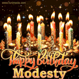 A glowing personalized birthday GIF with name Modesty featuring lit candles with intricate designs, warm lighting, and the text 'Happy Birthday' in an elegant font.