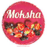Beautifully decorated red velvet berry birthday cake with vibrant fruits and a glowing 'Moksha' name, adding a touch of sweetness and sparkle.