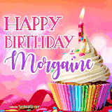 A vibrant birthday GIF featuring a rainbow-colored cupcake topped with white frosting, sprinkles, and a lit candle. The text reads 'Happy Birthday Morgaine' in bold pink and violet letters with white outline.