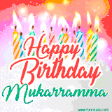 Bright birthday candles with rainbow flames on a cake, alongside the text 'Happy Birthday Mukarramma' in vibrant script in this celebratory animated GIF.