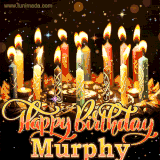 A glowing personalized birthday GIF with name Murphy featuring lit candles with intricate designs, warm lighting, and the text 'Happy Birthday' in an elegant font.