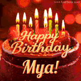 Beautifully decorated red velvet berry birthday cake with vibrant fruits and a glowing 'Mya' name, adding a touch of sweetness and sparkle.