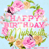 A charming animated GIF featuring 'Happy Birthday Mykhaila' in pink and green text, surrounded by delicate roses, leaves, and fluttering butterflies on a soft light blue pastel background.
