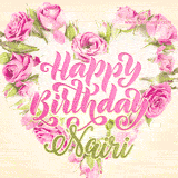 A stunning heart made of pink roses surrounds the elegant script text 'Happy Birthday Nairi' on a soft beige background. Animated sparkles add a magical and festive feel.