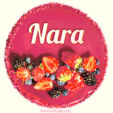 Beautifully decorated red velvet berry birthday cake with vibrant fruits and a glowing 'Nara' name, adding a touch of sweetness and sparkle.