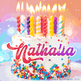A cheerful white birthday cake with multicolor sprinkles, lit candles, and 'Nathalia' written in vibrant letters, in an animated GIF.