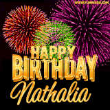 A golden 'Happy Birthday Nathalia' message with vibrant fireworks in the background, creating a festive and celebratory vibe in this animated name GIF.