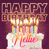 A colorful birthday cake topped with lit candles, with the words 'Happy Birthday Nettie' in bold glowing letters on a burgundy background. Animated flames add a festive touch.