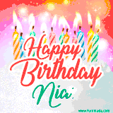 Bright birthday candles with rainbow flames on a cake, alongside the text 'Happy Birthday Nia' in vibrant script in this celebratory animated GIF.