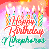 Bright birthday candles with rainbow flames on a cake, alongside the text 'Happy Birthday Nikephoros' in vibrant script in this celebratory animated GIF.