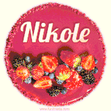 Beautifully decorated red velvet berry birthday cake with vibrant fruits and a glowing 'Nikole' name, adding a touch of sweetness and sparkle.