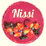 Beautifully decorated red velvet berry birthday cake with vibrant fruits and a glowing 'Nissi' name, adding a touch of sweetness and sparkle.