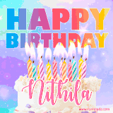 A vibrant animated name GIF with the words 'Happy Birthday Nithila' with colorful candles on a creamy cake. The background sparkles with pastel shades, adding a festive touch.