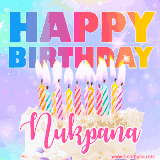 A vibrant animated name GIF with the words 'Happy Birthday Nukpana' with colorful candles on a creamy cake. The background sparkles with pastel shades, adding a festive touch.